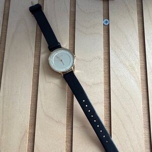 Elegant Black and Gold Women’s Skagen Watch